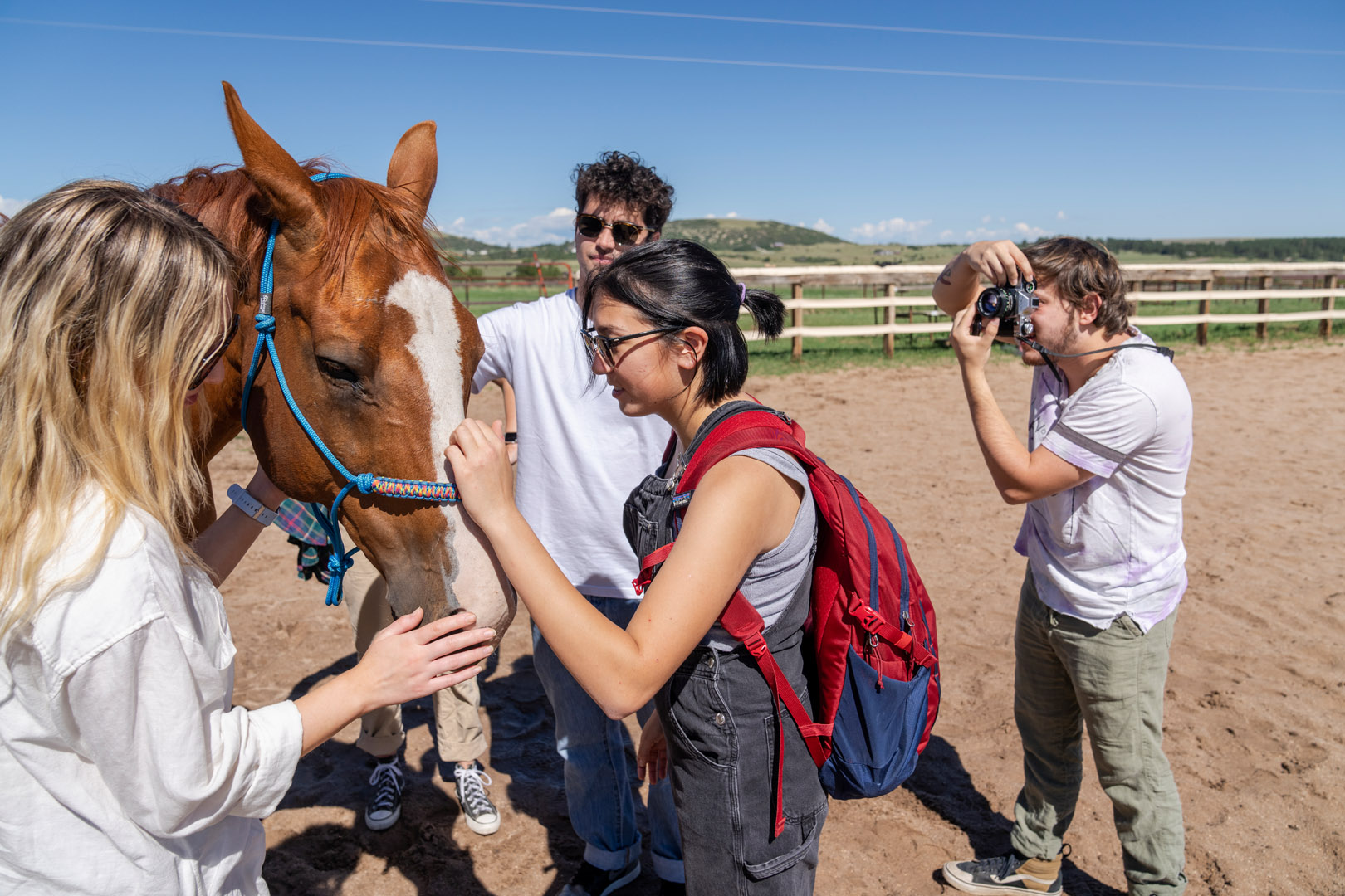 Students connect with Jimmy during Assistant Professor and Director of the Italian Program Amanda Minervini summer session course on an Equine-Guided Experience on Monday, 8/8/22. The goal of the experience is to teach students general focus and awareness. Photo by Lonnie Timmons III / Colorado College.