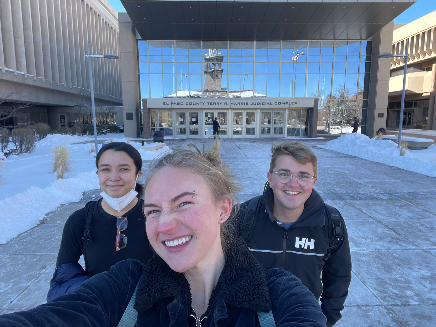 Isabelle Wangevoord ’25, Emma Fowkes '24, and Koray Gates '25 are pictured on Feb. 4, 2022, during one of the first trips the co-chairs took to the courthouse prior to taking groups of club members. Photo submitted by Koray Gates '25.