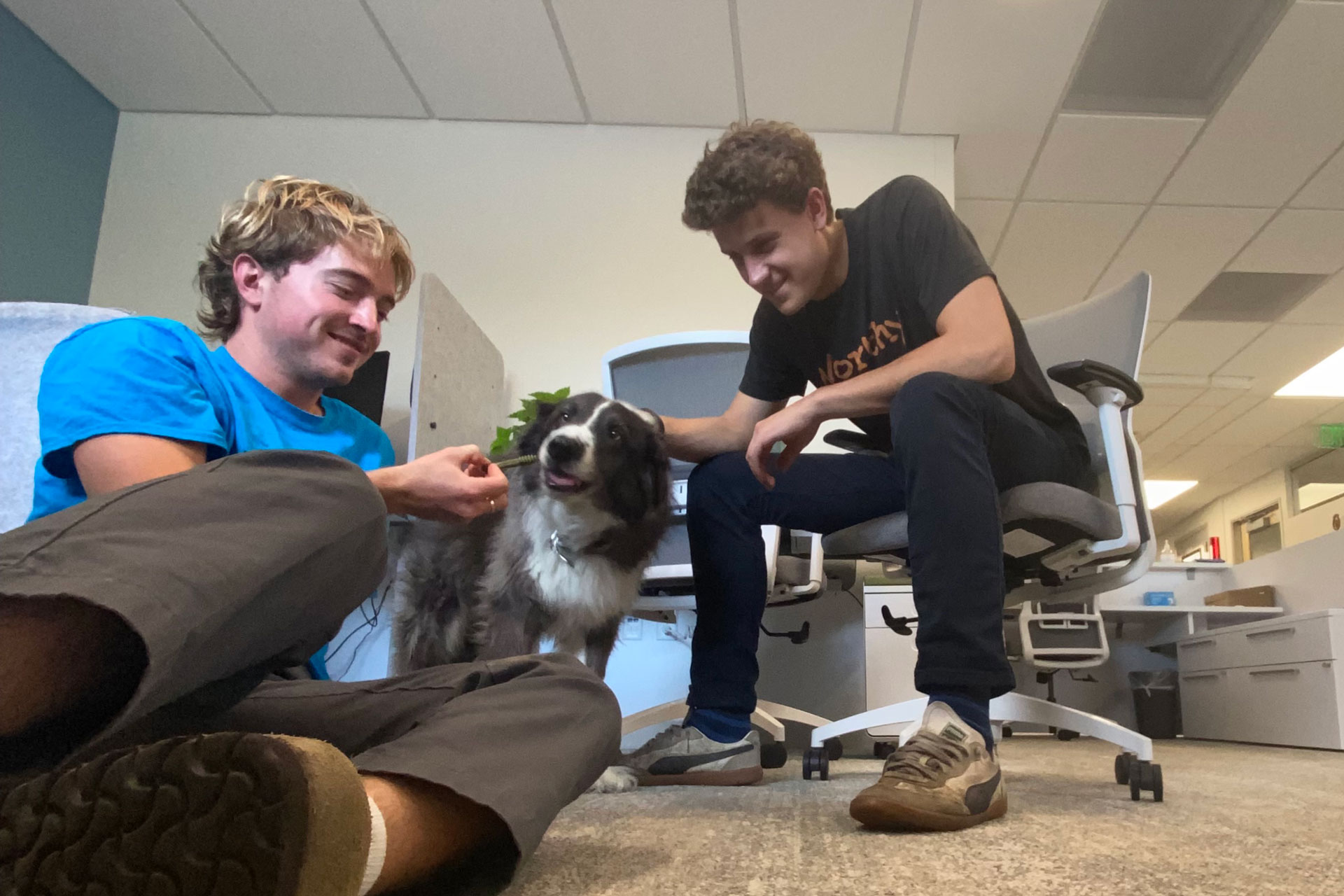 Will Taylor ’23 and Eli Jaynes ’24 are pictured on Aug. 2, 2022, with KRCC Station Manager Jeff Bieri’s dog, Marvin. Photos submitted by Will Taylor ’23 and Eli Jaynes '24. 