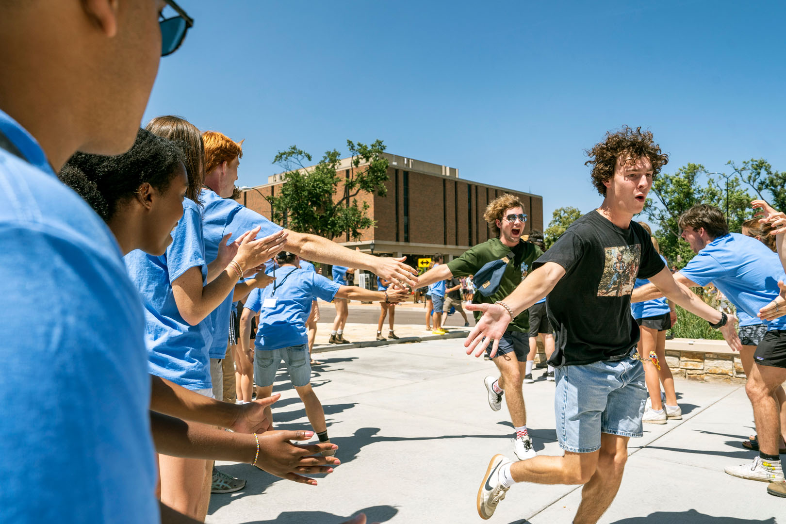 CC welcomes the Class of 2027 with a spirit tunnel to kick-off New Student Orientation outside Robson Arena.  Photo by Lonnie Timmons III / Colorado College.