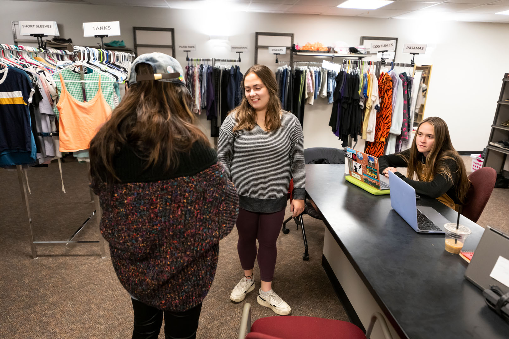 Annabelle Sparks ’23 and Kate Lamkin ‘24, co-student managers of the CC Exchange, are pictured working at the CC Exchange on Dec. 8, 2022. Photo by Lonnie Timmons III / Colorado College. 