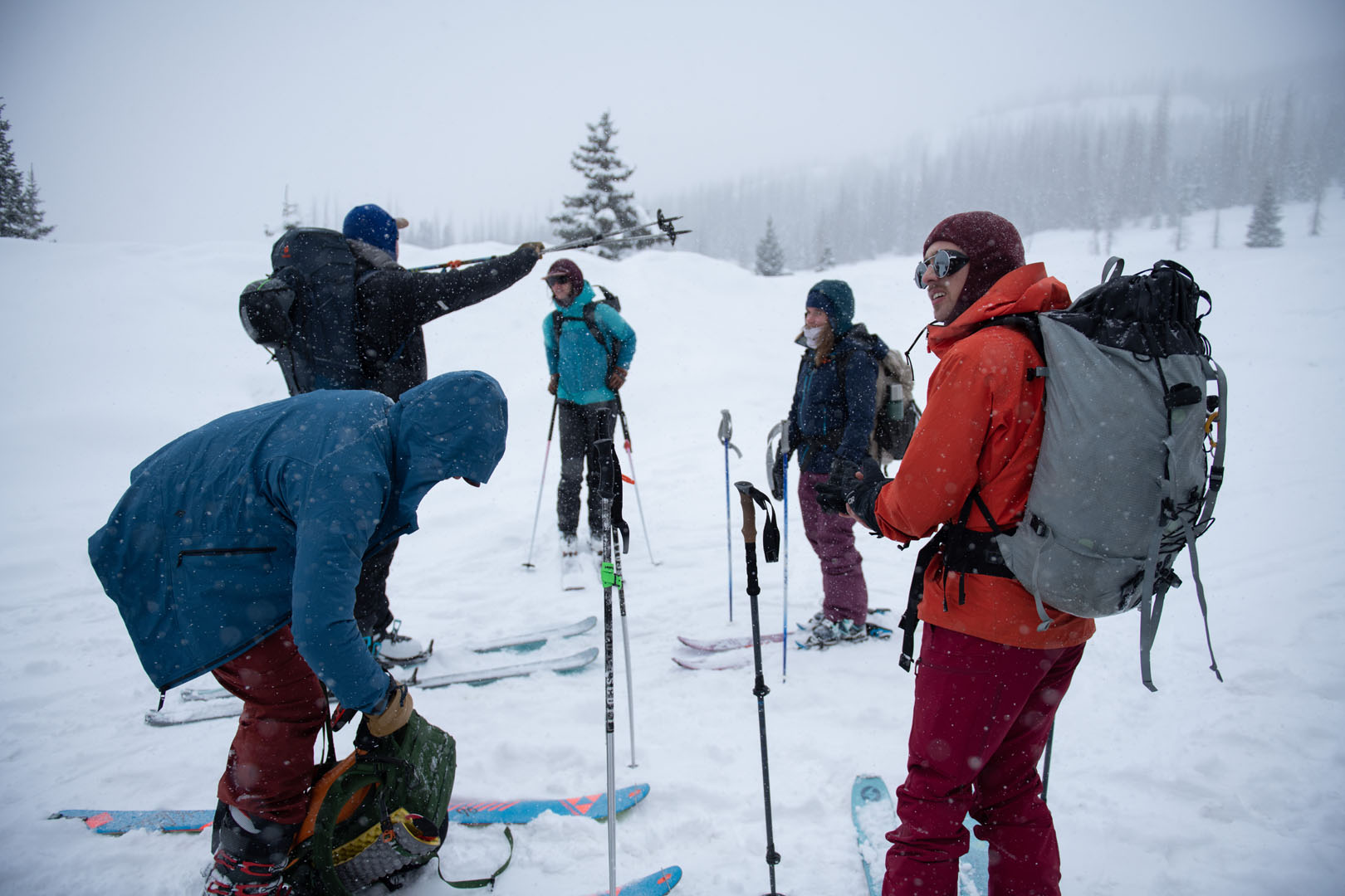 (L-R) Rueben Alters ’24, Jack Domeika ’23, Kate Reimer, Megan McVeigh ’23, and Owen Cox ’24 are pictured getting ready to leave for the day during their field trip to Wolf Creek Pass in their Snow Science Half Block class. Photo by Matthew Silverman '23, who served as a teaching assistant for the class. 
