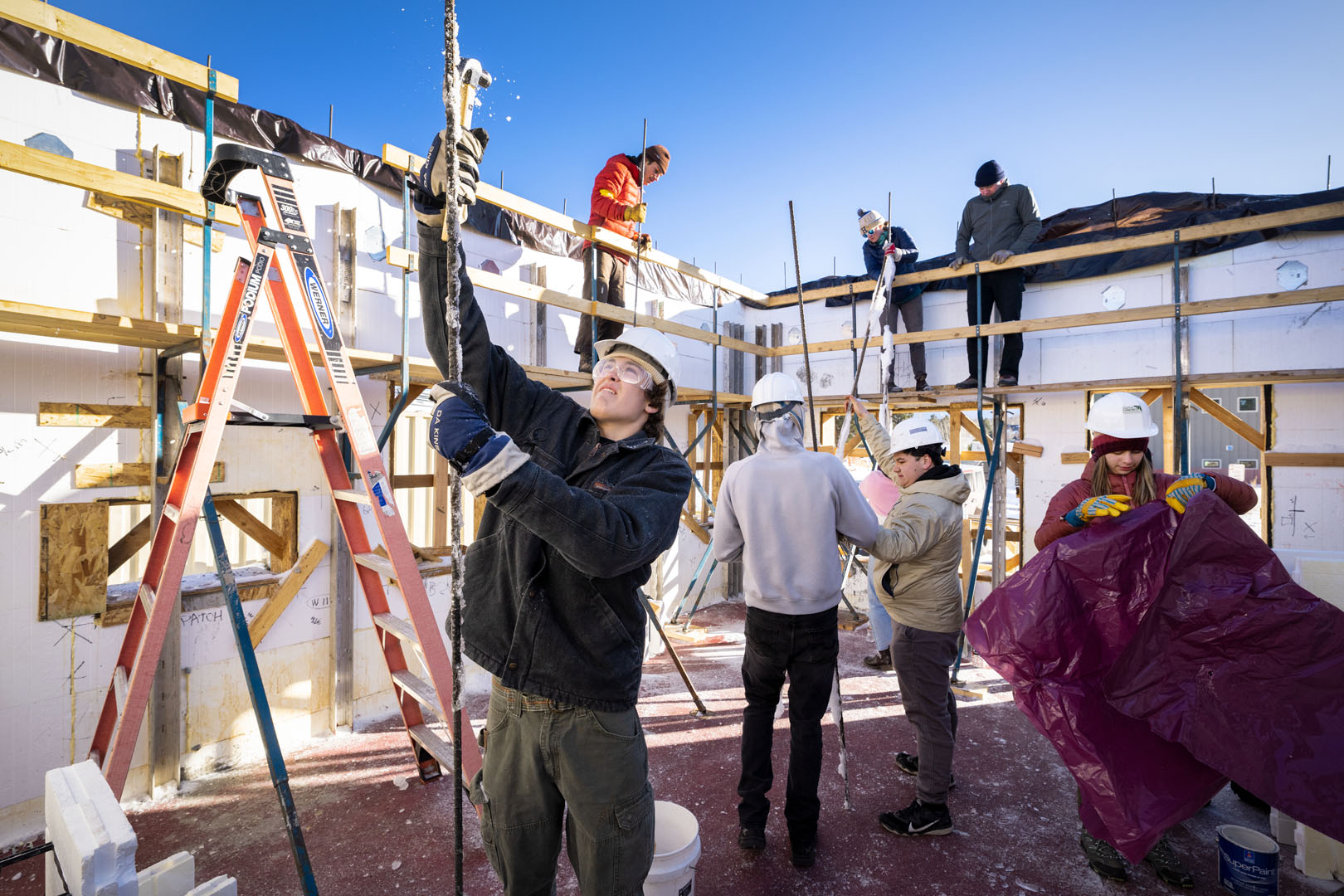Nate Watson ’26 is pictured working at a Habitat for Humanity work site in Woodland Park during his WSO Priddy Experience on Jan. 26, 2023. Photo by Lonnie Timmons III / Colorado College. 