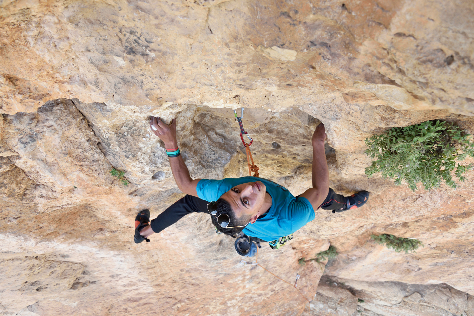 Urwah Askar on a route called “Yom Asel / Day of Honey," the first route bolted by Bruns and Harris in Palestine. (Photo by Ray Wood) 