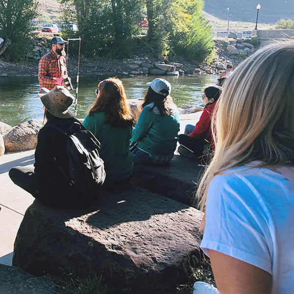  Office of Sustainability Director Ian Johnson sharing about water recreation in Salida, Colorado, during the Sense of Place CO Water Tour in 2019 to students and staff. 
