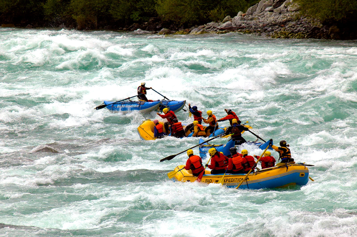 Two rafts and a cata-raft on the Futaleufú river. 