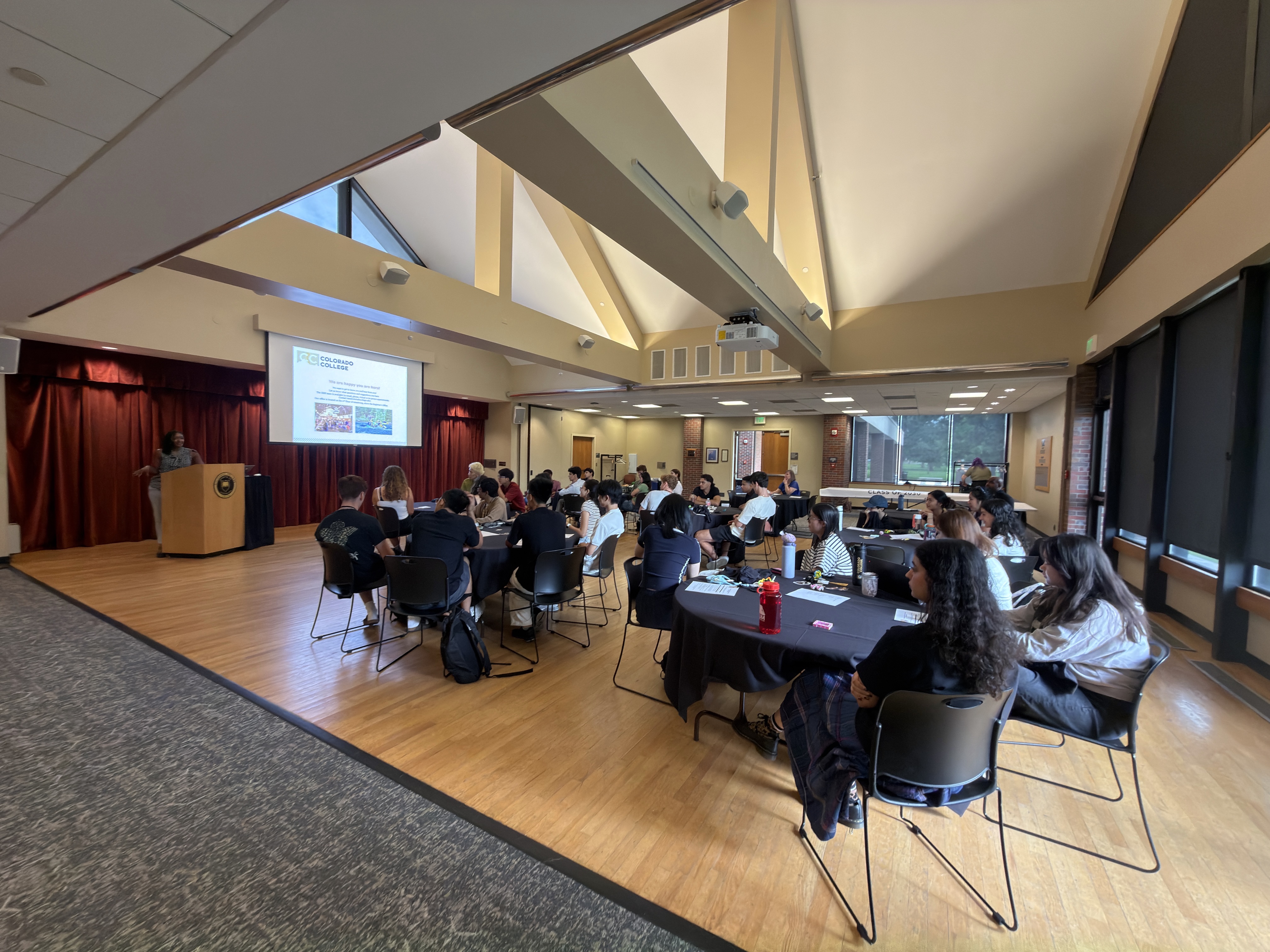 Manya speaks with CC's International Students at orientation