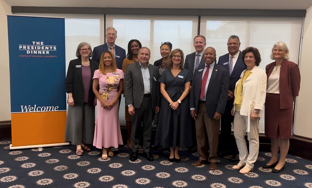 Manya posed with collegiate presidents