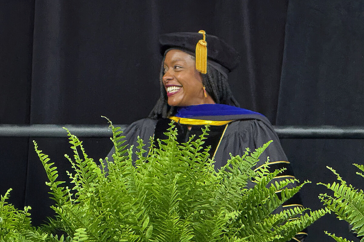 Manya Whitaker smiling during commencement