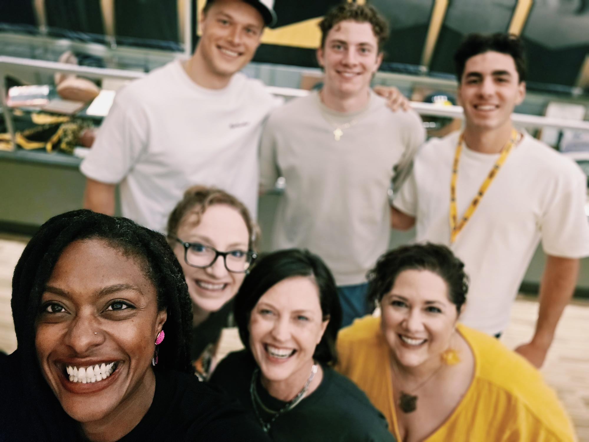 Manya poses with cabinet members and students during Worner After Dark