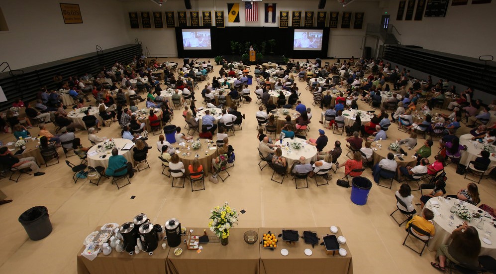 Staff attending Fall Conference in El Pomar Center main gym.