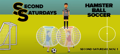 soccer field with two hamster ball soccer players and a referee