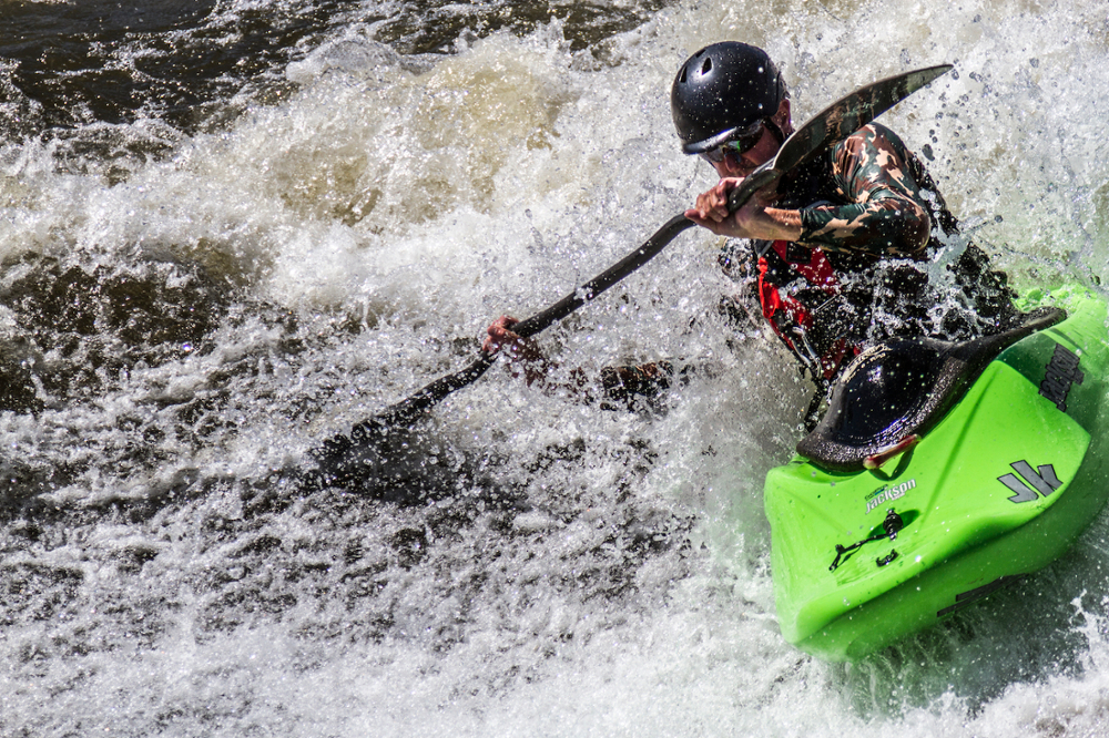 This photo was taken of a freestyle Kayaker in one of Denver's new river parks on the South Platte River. The South Platte is a river on the eastern side of the continental divide that provides water for many Front Range cities and eventually flows out to the Midwest. It is the primary source of water for Denver, the largest city in the Front Range, and now a source of recreation as well. On the weekends in the summer the city is able to request an excess of water to be released from a reservoir in Aurora to form artificial waves. 75% of Coloradans consider themselves outdoor enthusiasts and 96% think that the outdoor recreation economy is a vital part of the greater Colorado economy. Most of our recreation, if not all of it depend upon the protection and reduction of stress on our watersheds. <span class="cc-gallery-credit">[Jason Edelstein - 1/4000s, f/4, ISO 160, 105mm • Outdoor Recreation]</span>