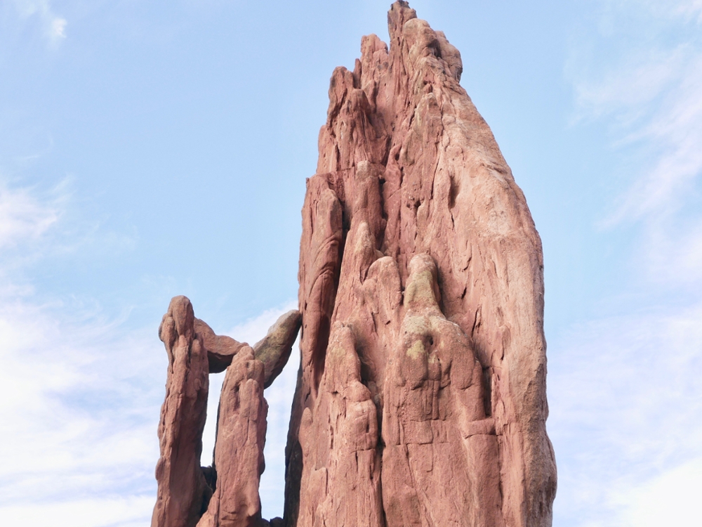 Seconds before this shot was taken, I passed by climbers scaling up the backside of this Lyon's sandstone formation at Garden of the Gods, Colorado Springs. Colorado's State of the West 2019 Poll found that 73% of poll takers attribute living near or in a national forest as a significant reason they lived in the West. These spaces, in their aesthetic beauty, recreational utility, and inspiring form remain key spaces to reimagine, play, and frolic in the wild. <span class="cc-gallery-credit">[Jane Hatfield • Shot on Leica D-Lux, ISO 200, 20.6 mm • Outdoor Recreation]</span>