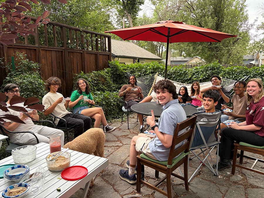The Mathematics & Computer Department hosted Friday night BBQs open to all students and faculty in Mathematics and Computer Science doing research on campus, including non-MCURE students. MCURE students and faculty, as well as students and faculty doing other research on campus, are pictured at the final Friday night BBQ on July 31, 2026. Photo provided by 2026 MCURE Program Director Molly Moran.
