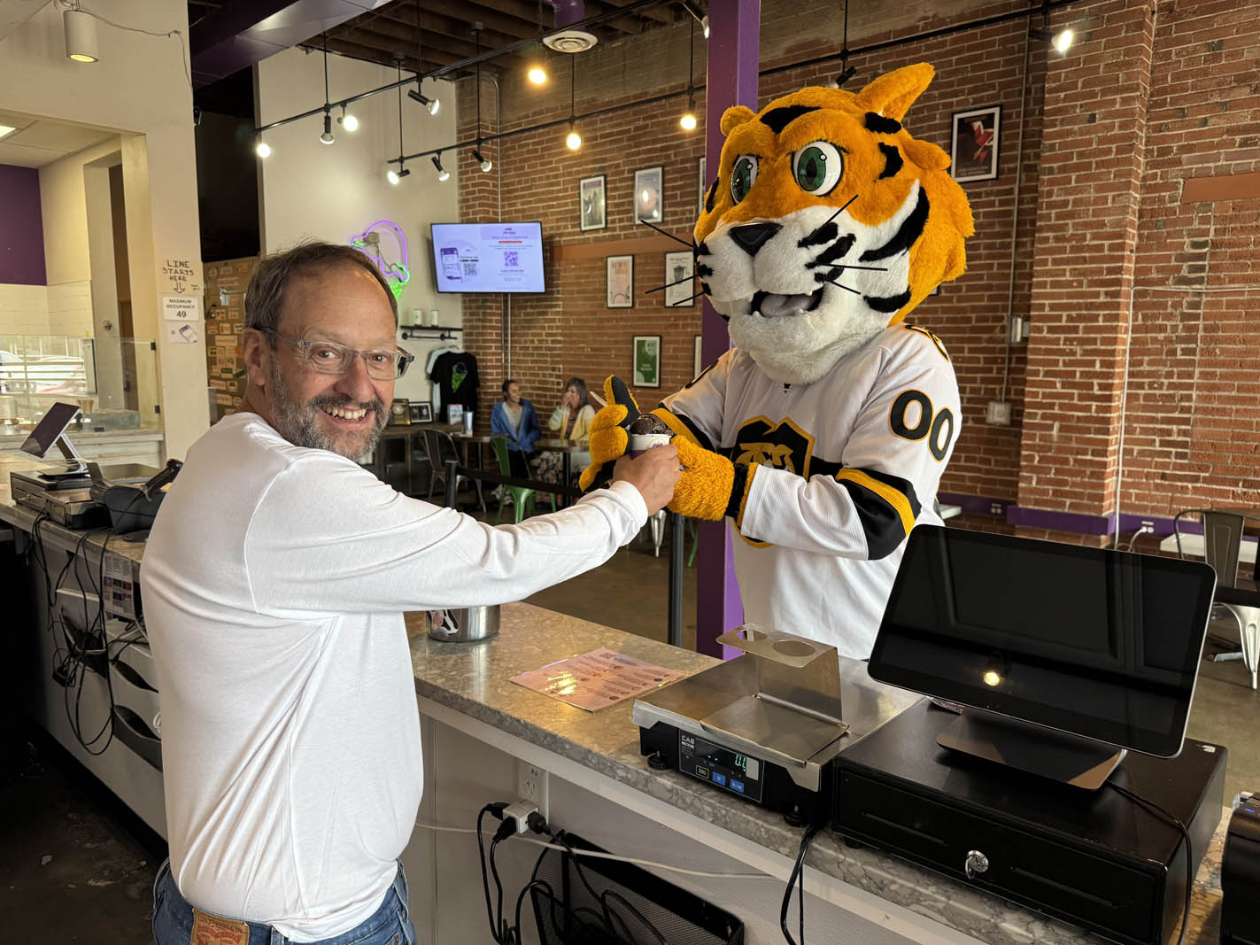 Colorado College alumnus John Krakauer ’85 and RoCCY. Photo courtesy of Colorado College.