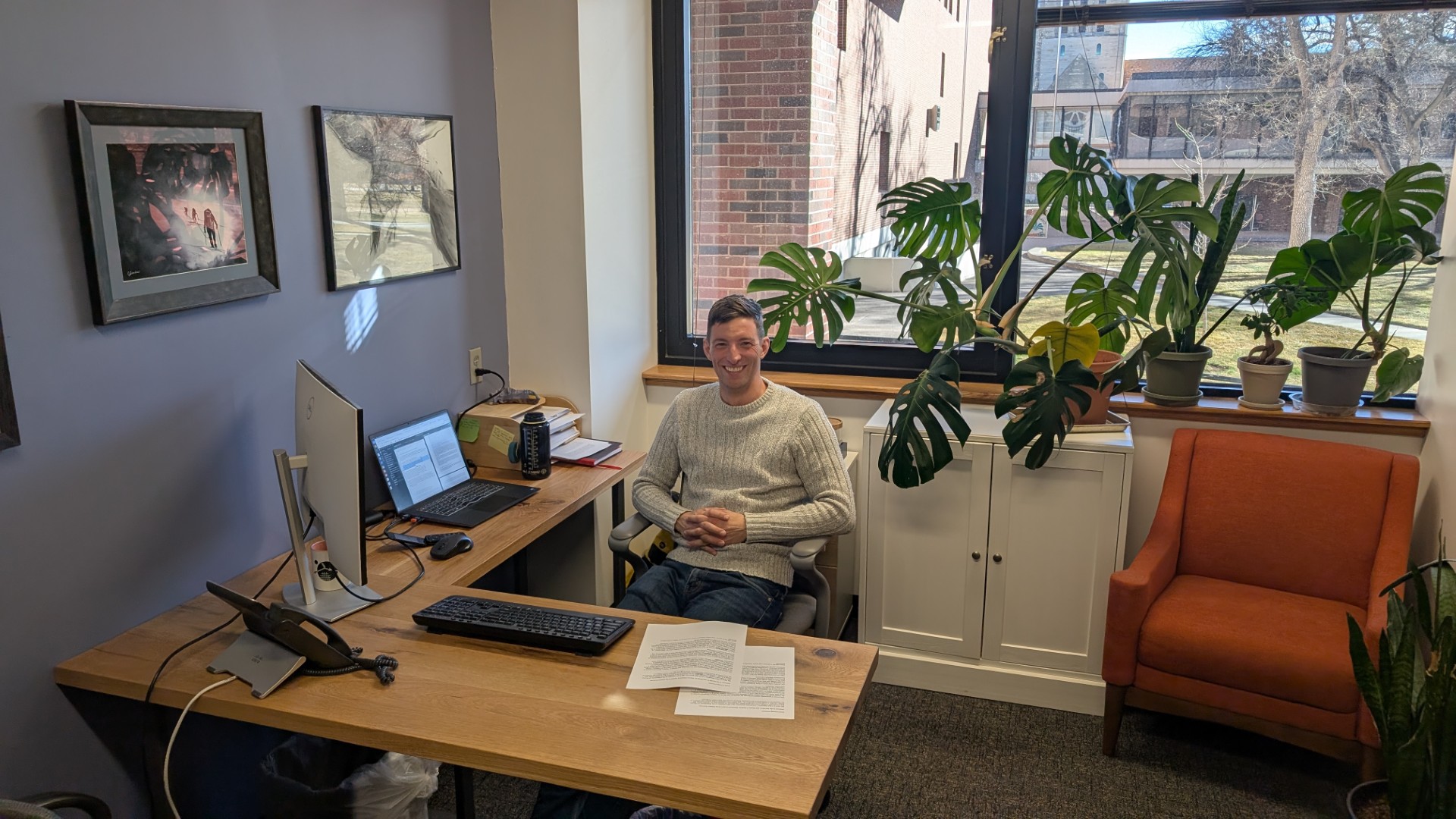 Assistant Professor of Physics Christopher Monahan in his office within the Barnes Science Center in February 2026. Photo provided by Monahan.