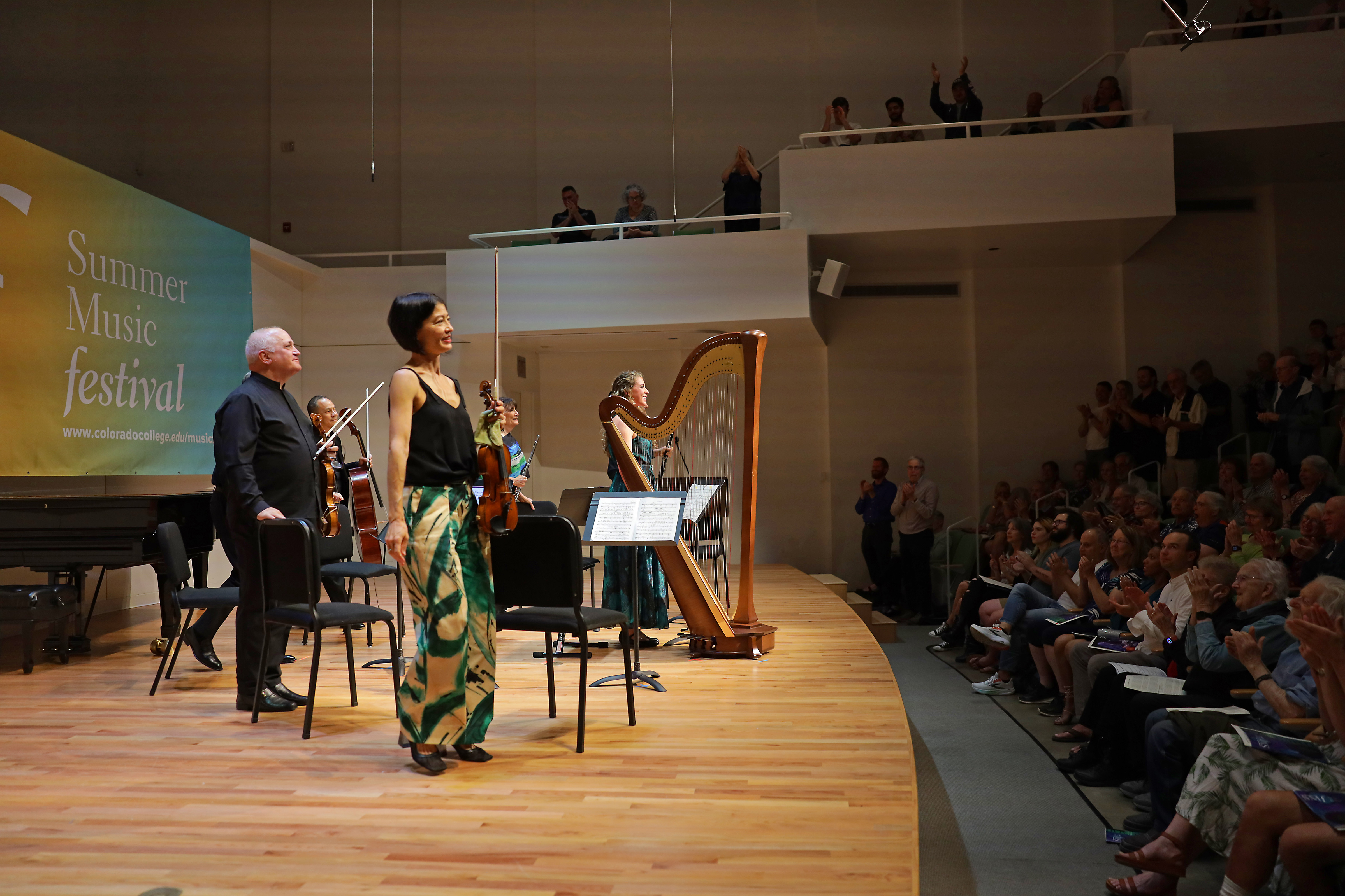 Festival Artists stand on the Packard Hall stage following a 2025 performance.
