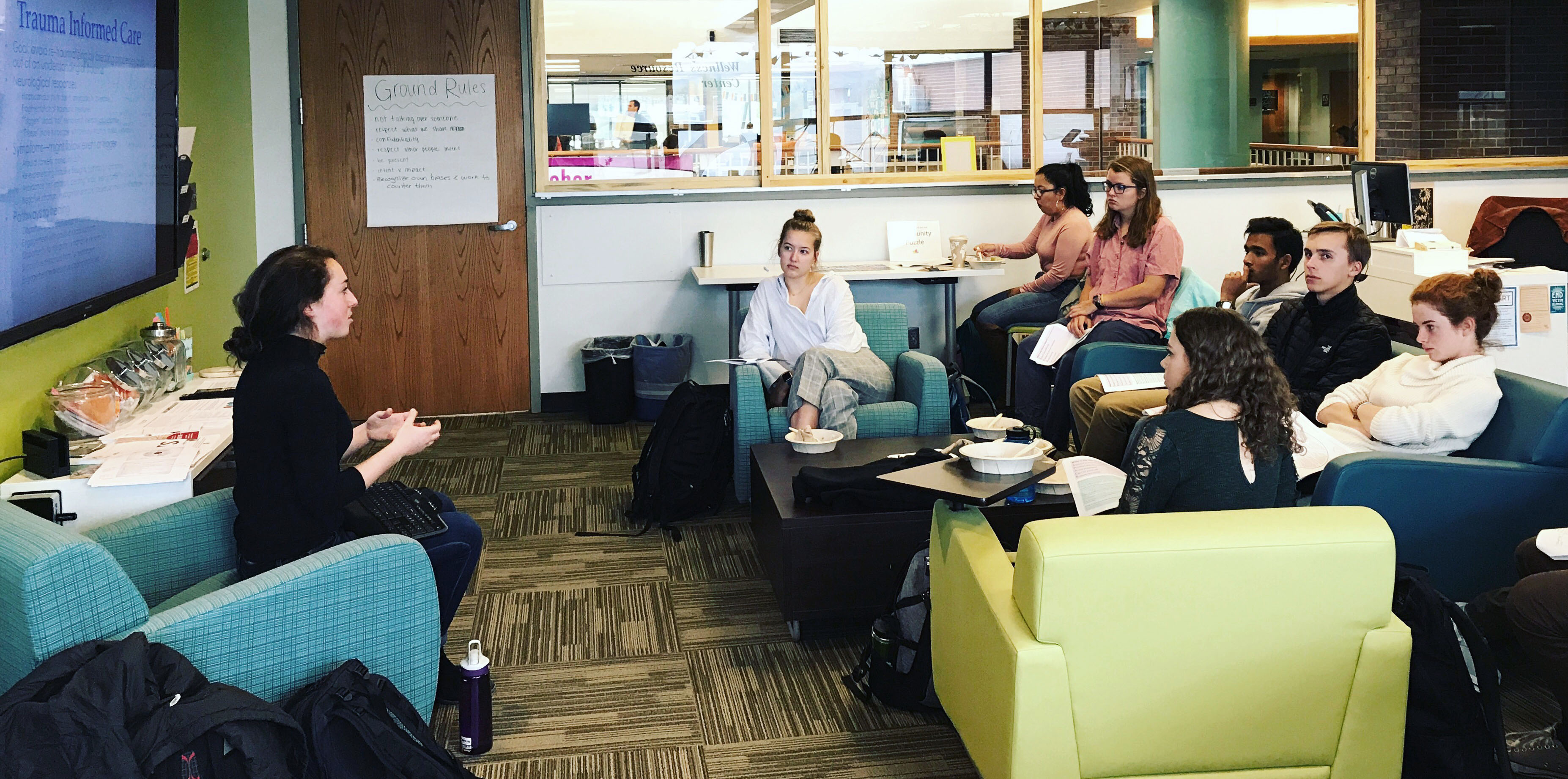 Paraprof Montana Bass '18 leads students in a workshop on providing trauma informed care for survivors of gender-based violence.