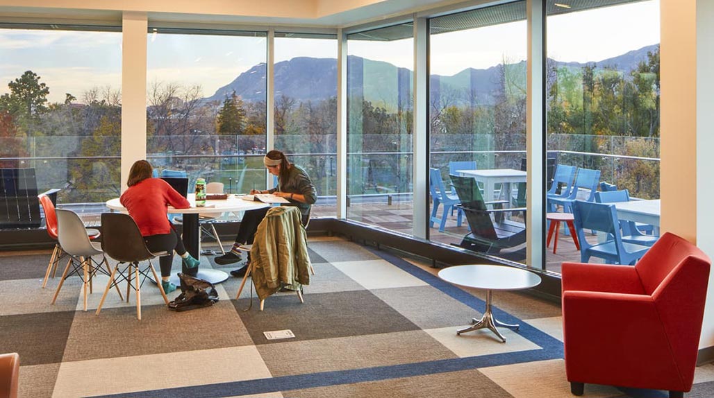 Students studying on a couch